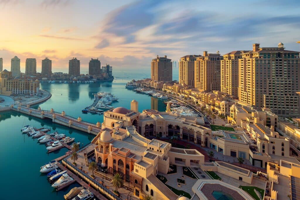 Panoramic view of Doha’s skyline with modern skyscrapers and the waterfront.